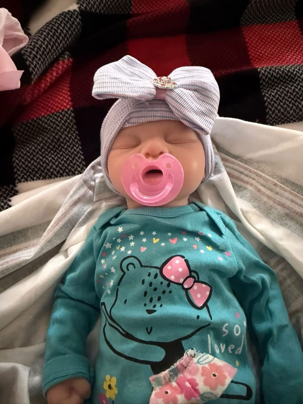 Plush Baby Doll with Pink Pacifier and Teal Outfit